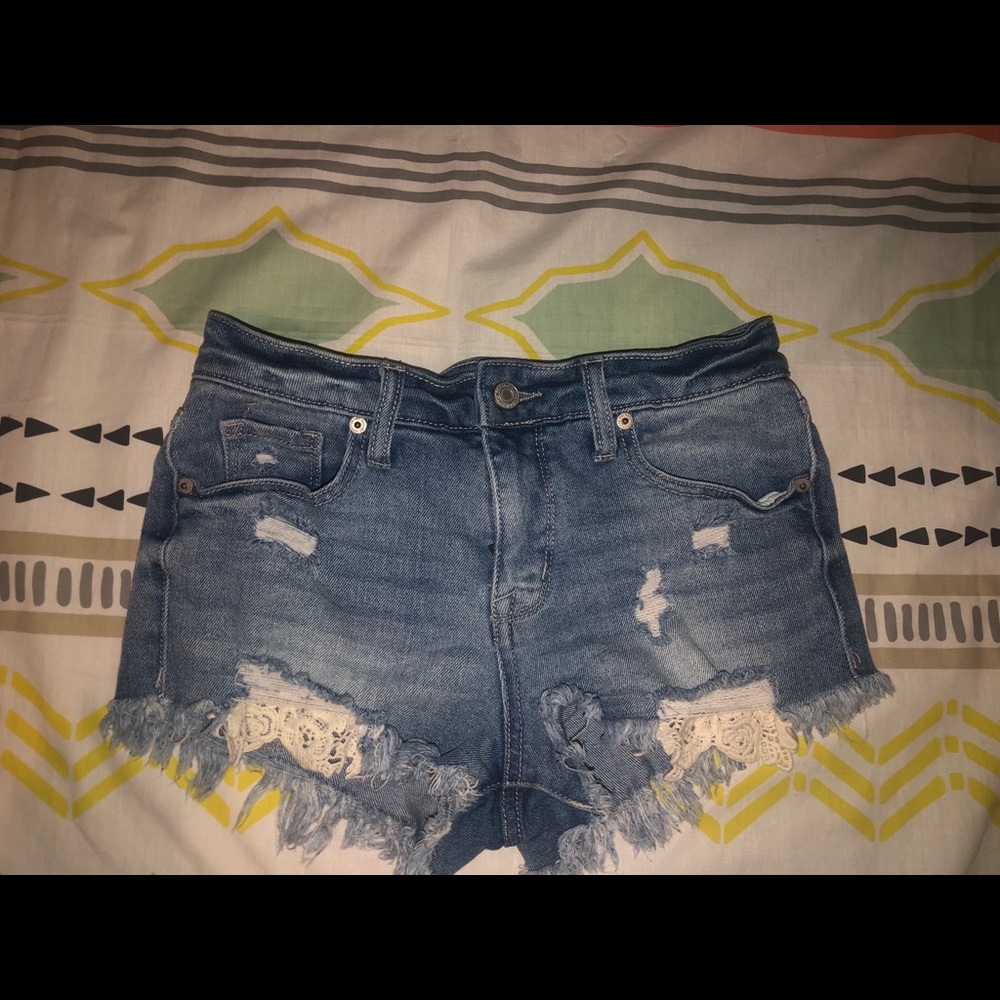 blue jean shorts with lace pockets